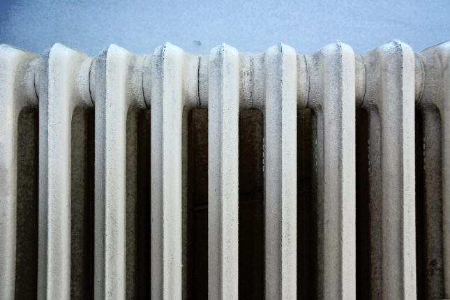 Radiator on blue wall